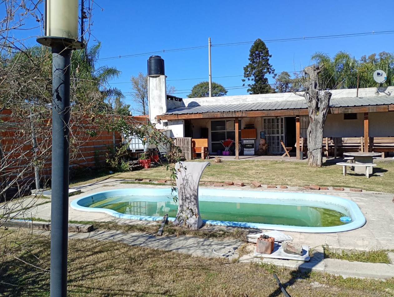 CASA CON GRAN TERRENO EN SAUCE MONTRULL RN12