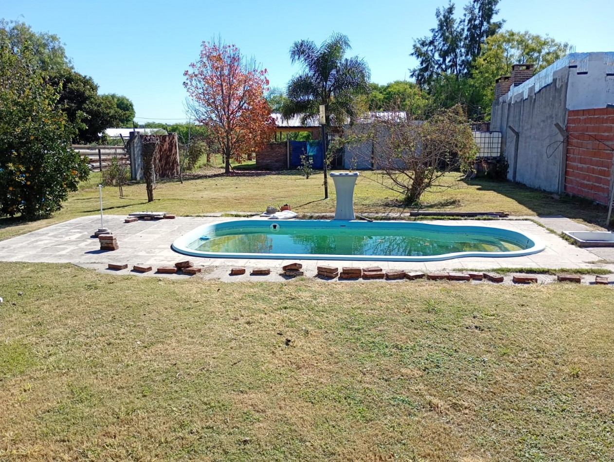 CASA CON GRAN TERRENO EN SAUCE MONTRULL RN12